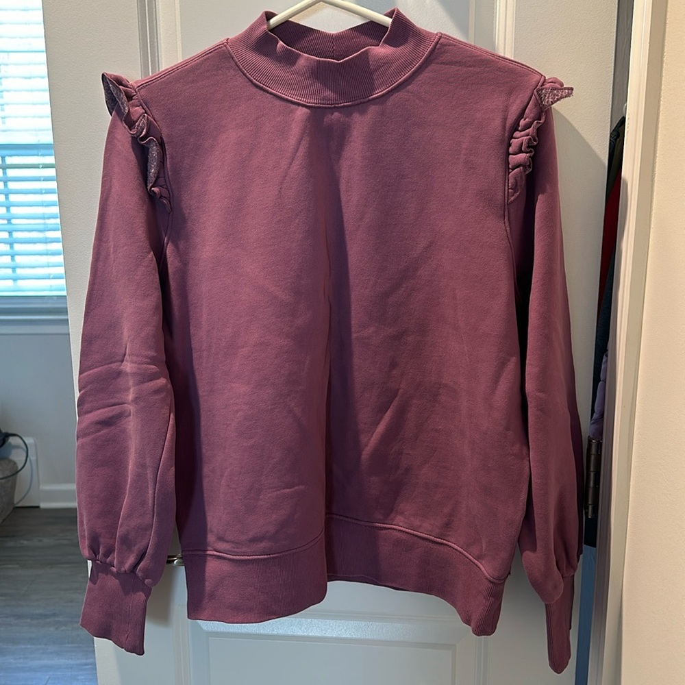Purple sweatshirt with ruffles